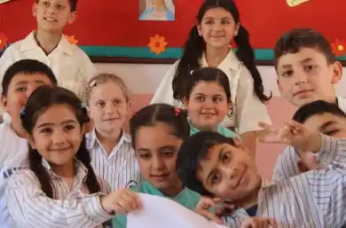 kids saying thanks to acn