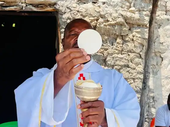 A priest celebrating Mass in Angola