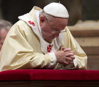Pope Francis Kneeling And Praying E1498503028352.jpg